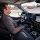 A driver uses Ford’s BlueCruise.